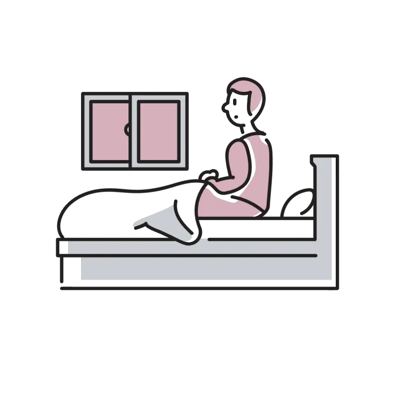 ベッドでくつろぐ女性